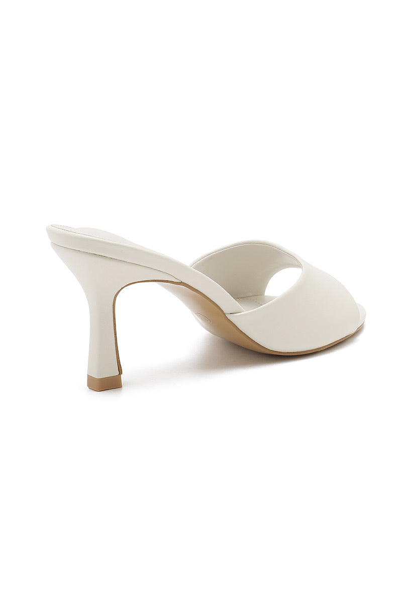 Heeled mules - White