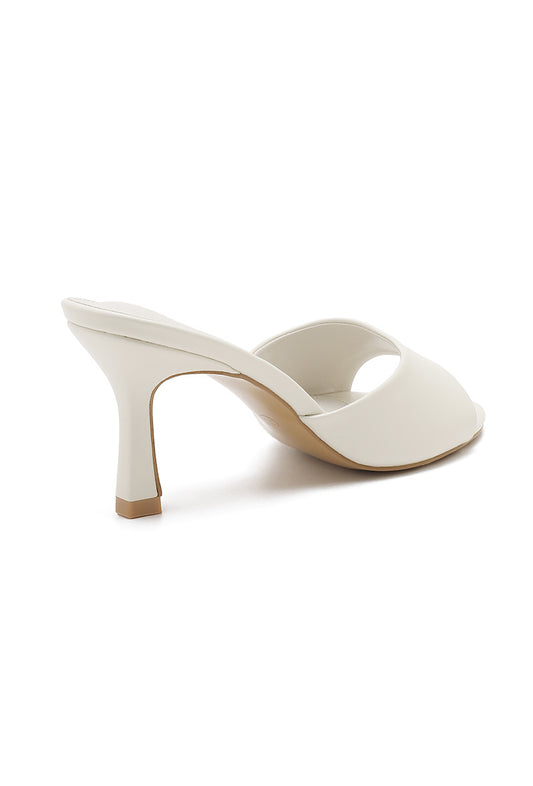Heeled mules - White