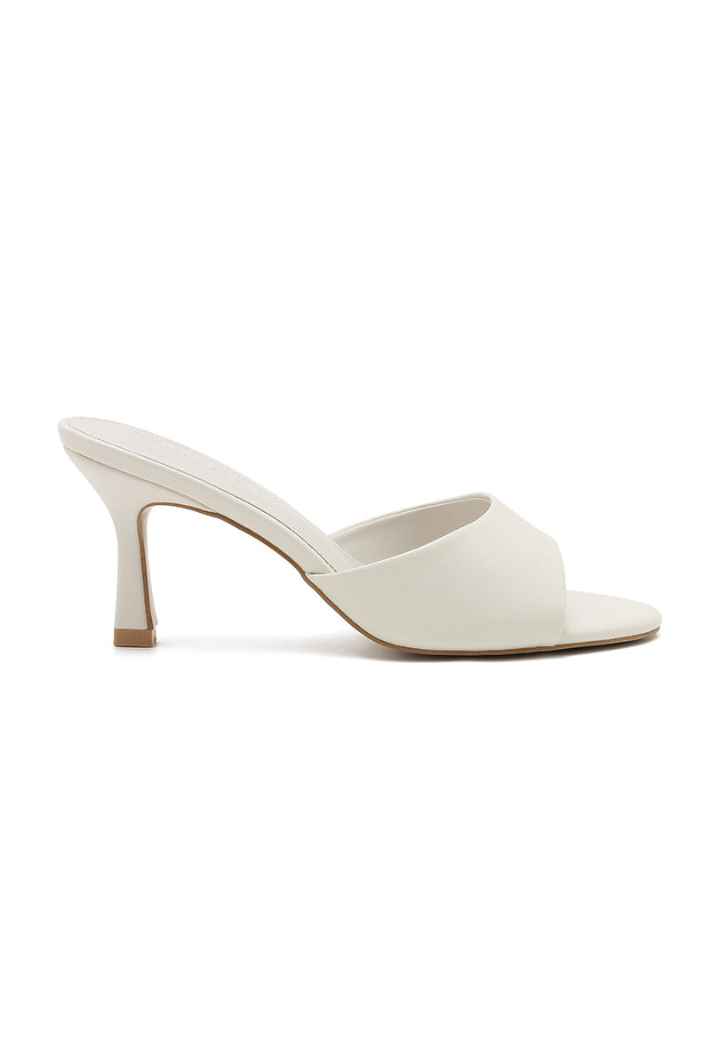 Heeled mules - White
