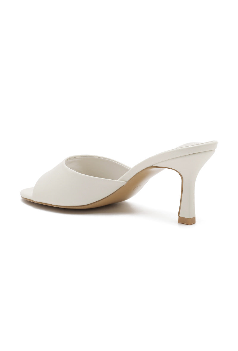Heeled mules - White